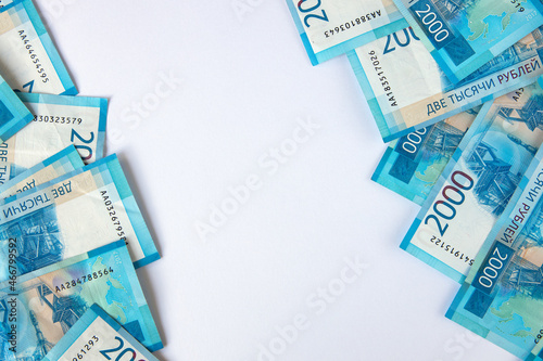 Wallpaper Mural Background from Russian money, frame from many banknotes rubles, denomination 2000, copy space. Concept cash, salary, loan, wealth, credit, finance, business, deposit, insurance. Top view, flat lay Torontodigital.ca