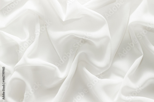 white material flows in soft folds background