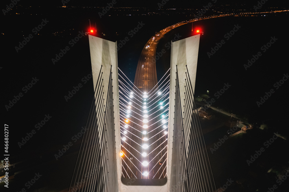 Obraz premium Redzin Bridge in Wroclaw at dusk, Beautifully lit by white lamps, Pole pylons
