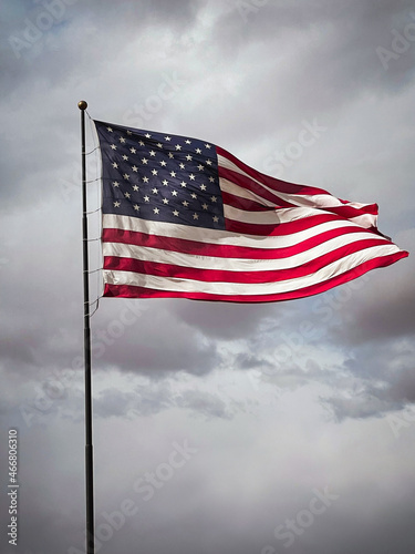US Flag - American Flag - red-white-and-blue, Stars and stripes set against a stormy sky