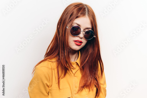 attractive woman hairstyle glamor sunglasses glamor light background © VICHIZH