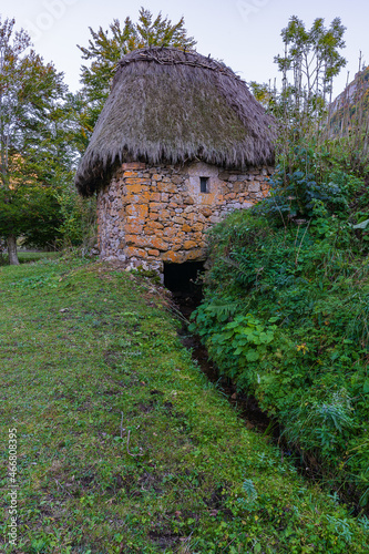 Traditional mill with a broom roof, Teito, in the town of Valle de Lago in the council of Somiedo, in Asturias.  photo