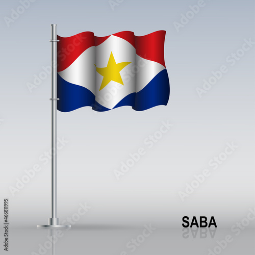 Flag of Saba flying on a flagpole stands on the table.