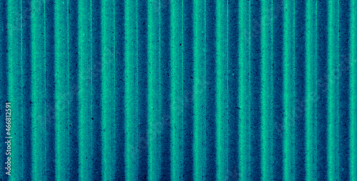 blue striped background of corrugated cardboard