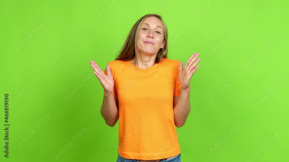 Young blonde girl with surprise and shocked facial expression over isolated background. Green screen chroma key Young blonde girl with surprise and shocked facial expression over isolated background. Green screen chroma key