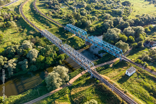 Railway bridge over the river, an old construction from the early 20th century. Protva River, Kaluzhskiy Region, Russia