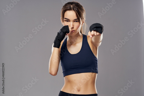 beautiful woman boxing workout exercises fitness posing dark background