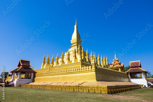 Golden beautiful temple Vientiane Laos Colorful sky