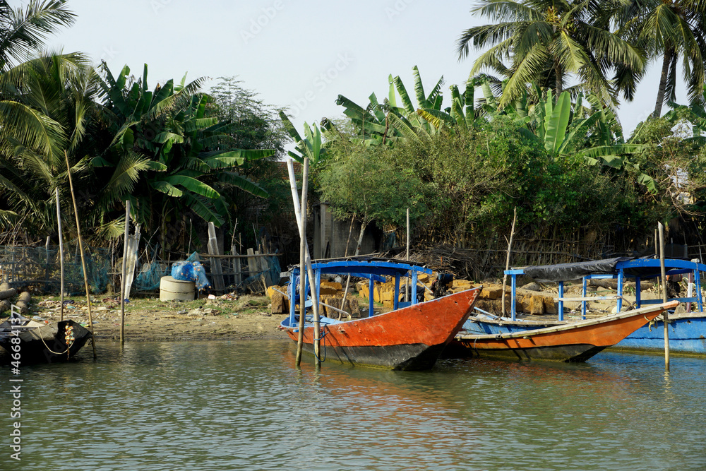 Boats along the the Chilika lake. Chilika lake is the largest coastal lagoon in India and the largest brackish water lagoon in the world.