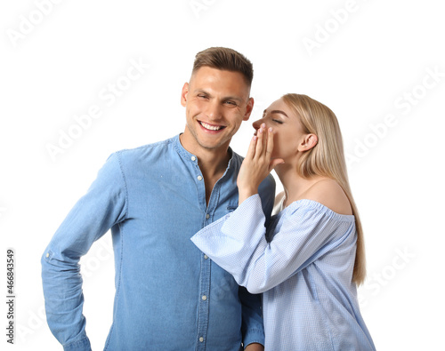 Gossiping young couple on w...
