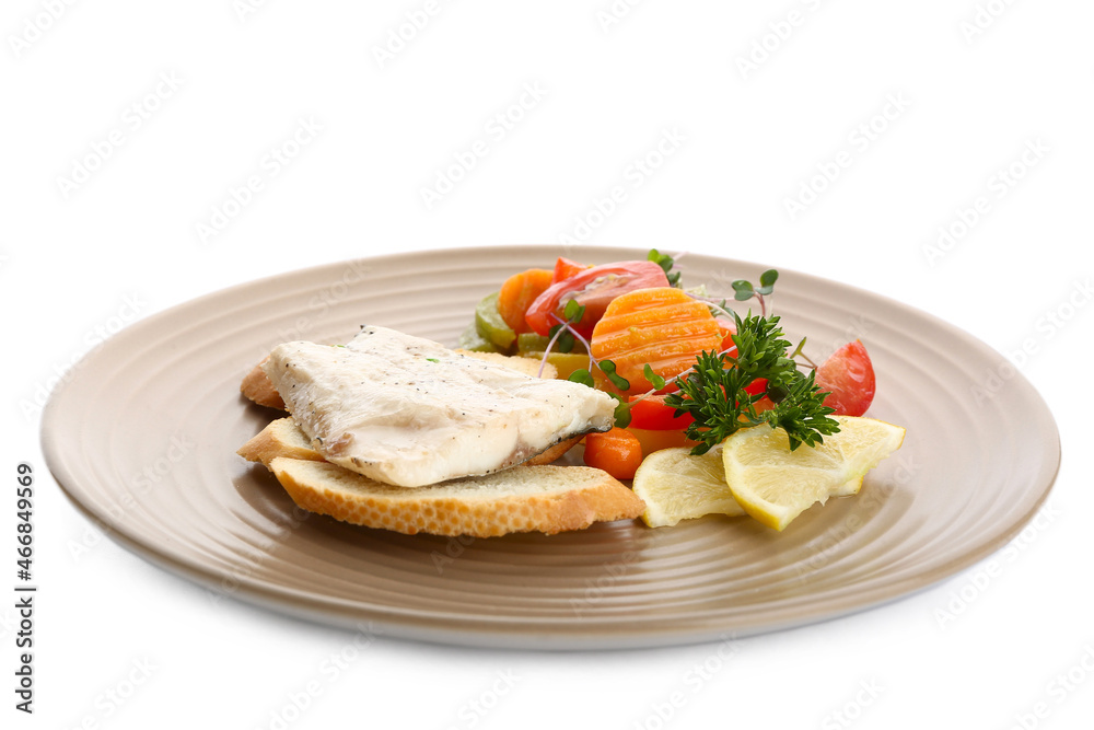 Plate of tasty sea bass fish with vegetables on white background Plate of tasty sea bass fish with vegetables on white background