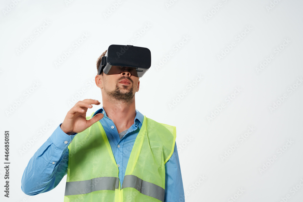 engineer in a white helmet construction VR glasses isolated background engineer in a white helmet construction VR glasses isolated background
