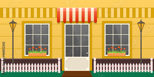 Cosiness village yellow house facade street. Cozy exterior of countryside building entrance, windows