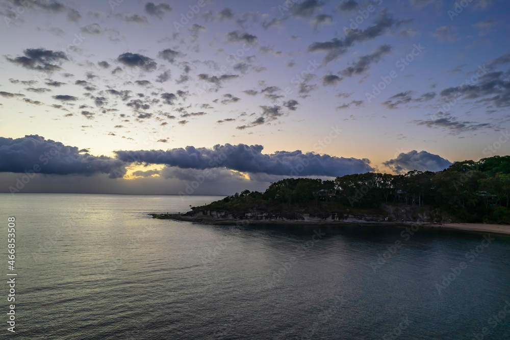 Aerial sunrise seascape with clouds