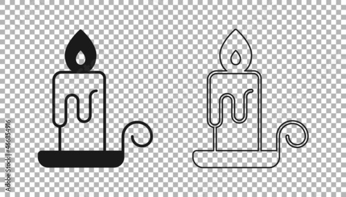 Black Burning candle in candlestick icon isolated on transparent background. Cylindrical candle stick with burning flame. Vector