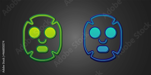 Green and blue Facial cosmetic mask icon isolated on black background. Cosmetology, medicine and health care. Vector