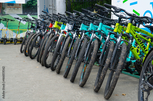 Bike rental. Many bicycles in the open air.