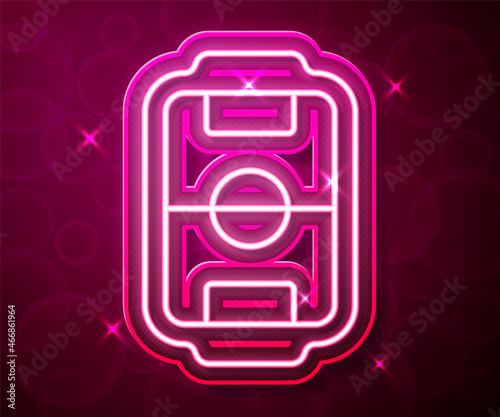 Glowing neon line Table football game hobby or leisure icon isolated on red background. Sport team football players. Vector