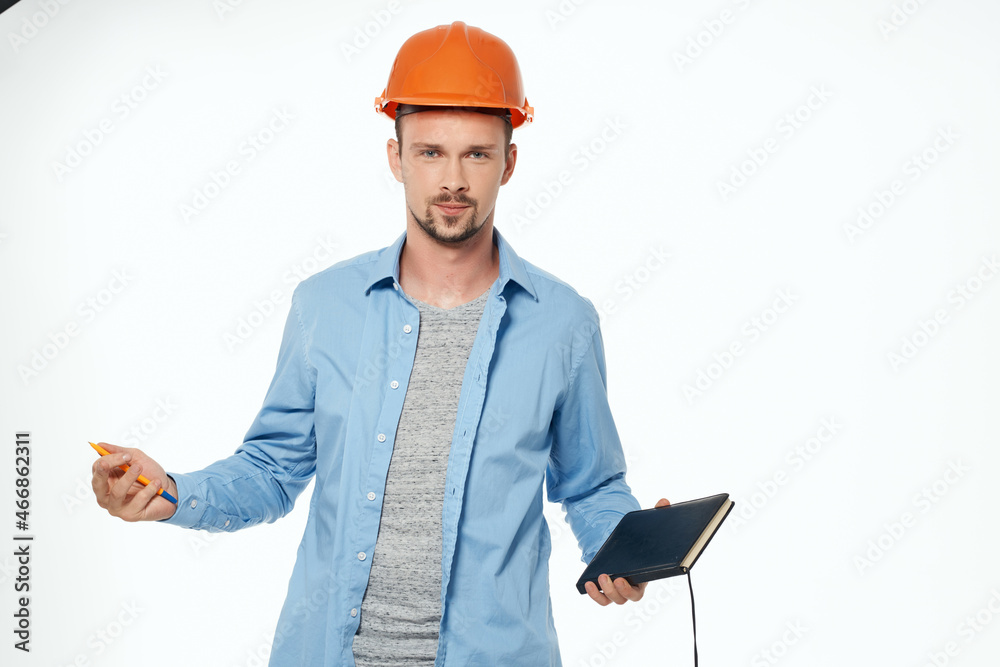 man in construction uniform Professional Job light background man in construction uniform Professional Job light background