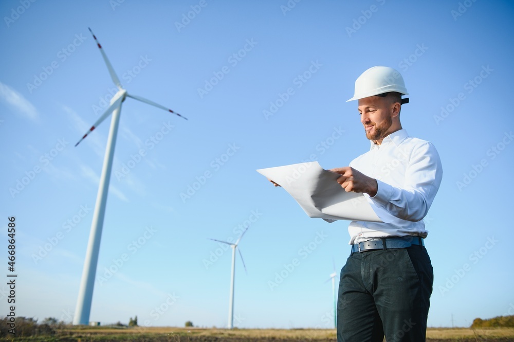 Businessmen engineering standing handsome smile front of turbine looking away Businessmen engineering standing handsome smile front of turbine looking away