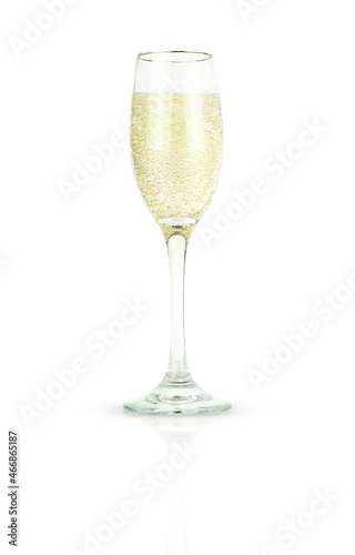 A glass of sparkling wine is isolated on a white background