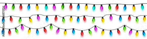 Christmas glowing lights. Festival garlands with colorful bulbs. Greeting card design element. New Year, winter holidays.