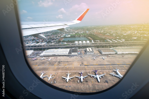 Canvas Print Aerial view of an international airport during sunrise.
