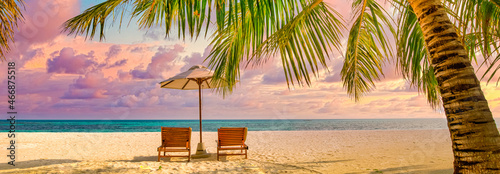 Beautiful beach. Chairs on the sandy beach near the sea. Summer holiday and vacation concept for tourism. Inspirational tropical landscape. Tranquil scenery  relaxing beach  tropical landscape design