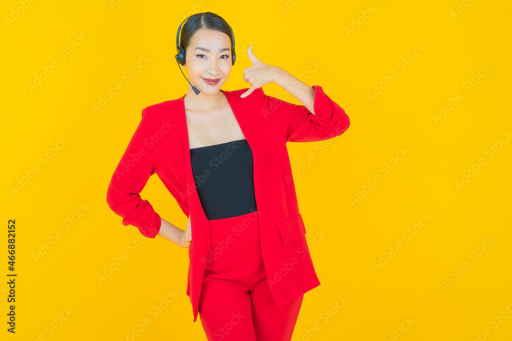 Portrait beautiful young asian woman with call center customer care service center Portrait beautiful young asian woman with call center customer care service center