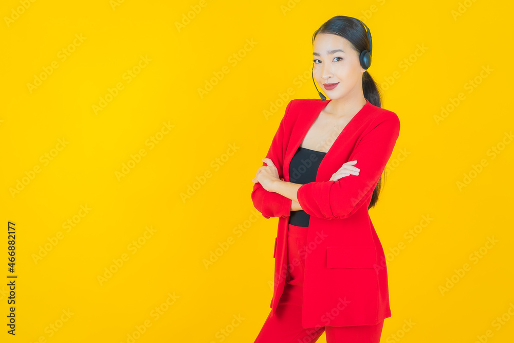 Portrait beautiful young asian woman with call center customer care service center Portrait beautiful young asian woman with call center customer care service center