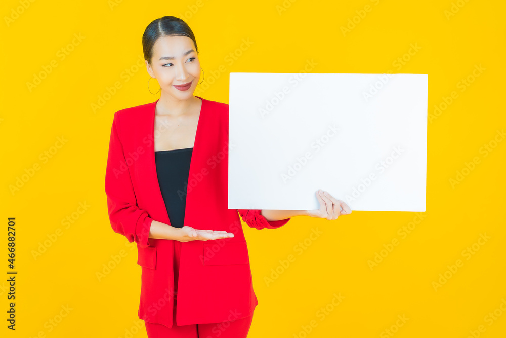 Portrait beautiful young asian woman with empty white billboard Portrait beautiful young asian woman with empty white billboard