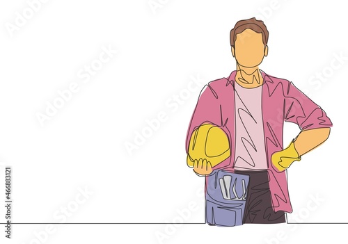 One single line drawing of young craftsman wearing building construction uniform while holding helmet. Handyman house renovation service concept. Continuous line draw design illustration