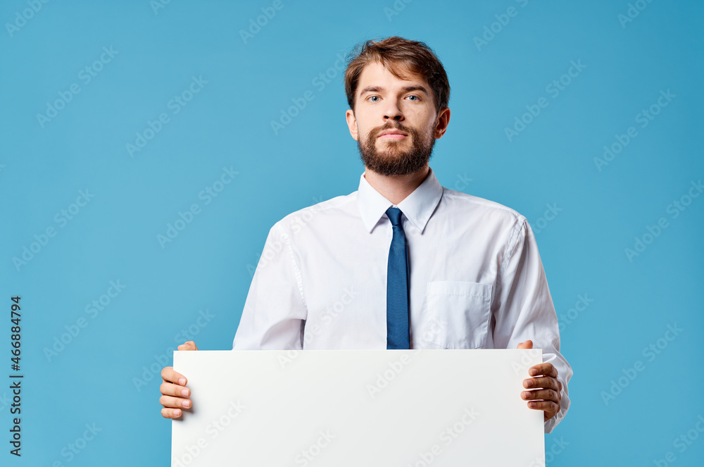manager White mockup poster in hand advertising blue background manager White mockup poster in hand advertising blue background