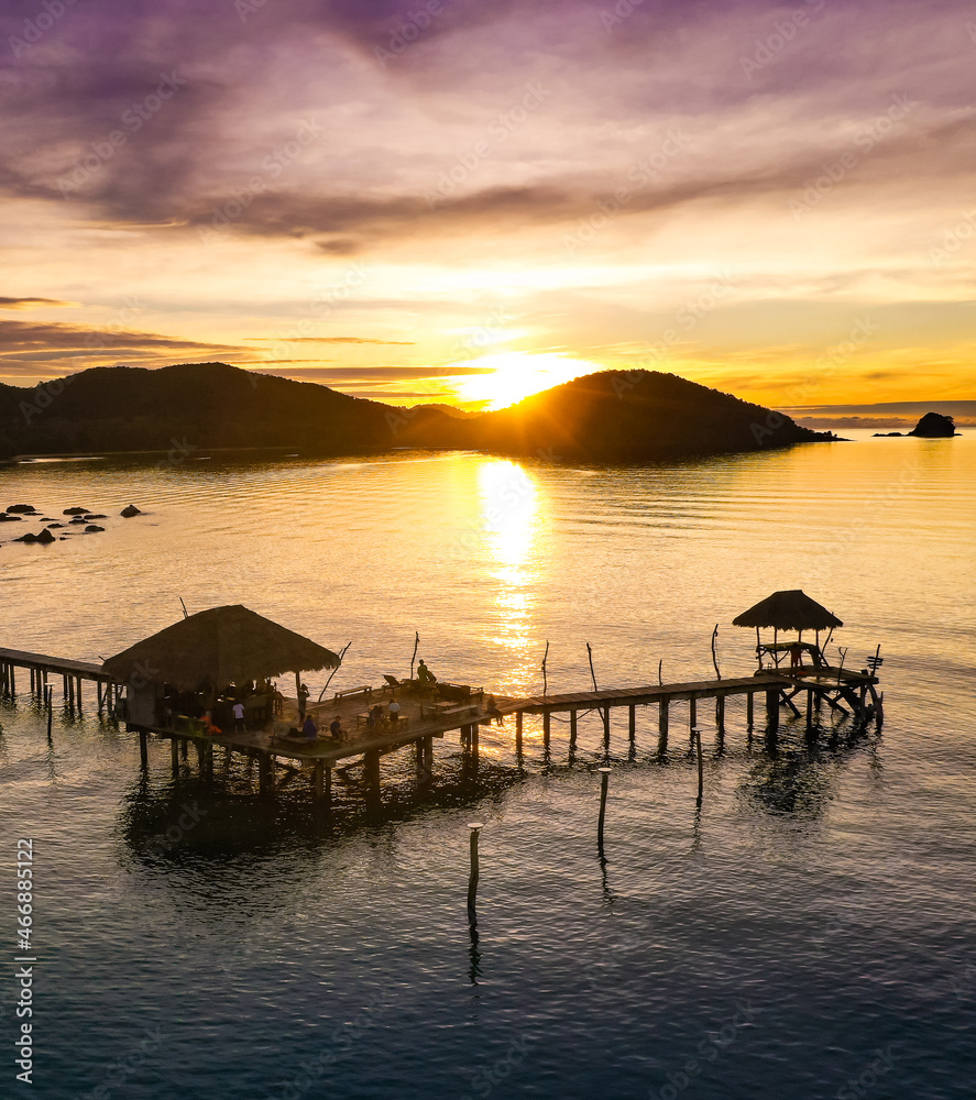 Wooden beach bar in sea and hut on pier in koh Mak island, Trat, Thailand Wooden beach bar in sea and hut on pier in koh Mak island, Trat, Thailand
