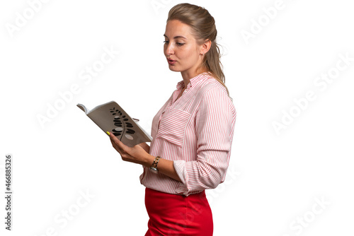Young girl teacher with a notebook in her hands. Tells students a lecture and will take their exam. White background. Place for text