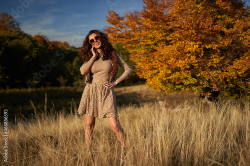 Autumnal portrait of a beautiful woman outdoors © Xalanx