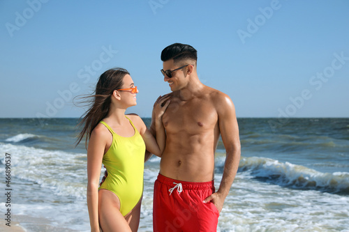 Lovely couple spending time together on beach