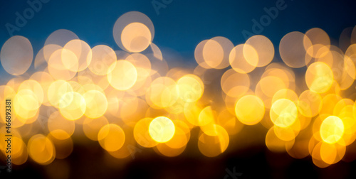 gold abstract background with bokeh defocused lights