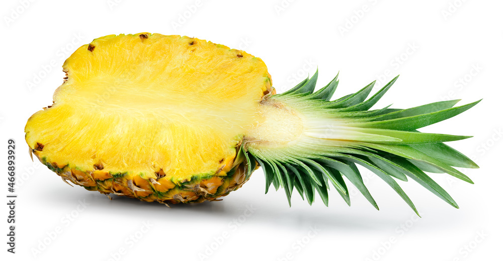 Pineapple half with leaves isolated. Cut pineapple on white background