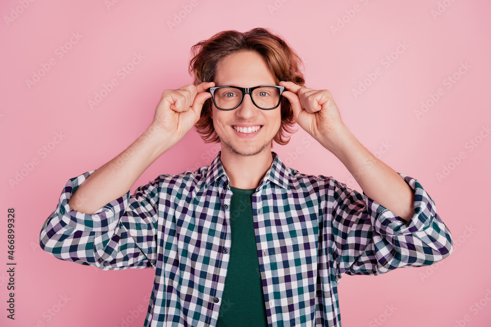 Close-up portrait of cheerful guy happy positive smile eyewear oculist isolated over pink color background Close-up portrait of cheerful guy happy positive smile eyewear oculist isolated over pink color background