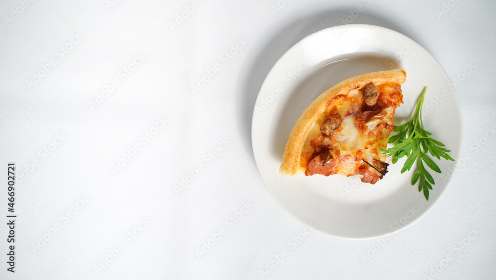 a slice of Italian pizza on a white plate with some tasty topping on it. a studio shot of a delicious food with copy space. a slice of Italian pizza on a white plate with some tasty topping on it. a studio shot of a delicious food with copy space.