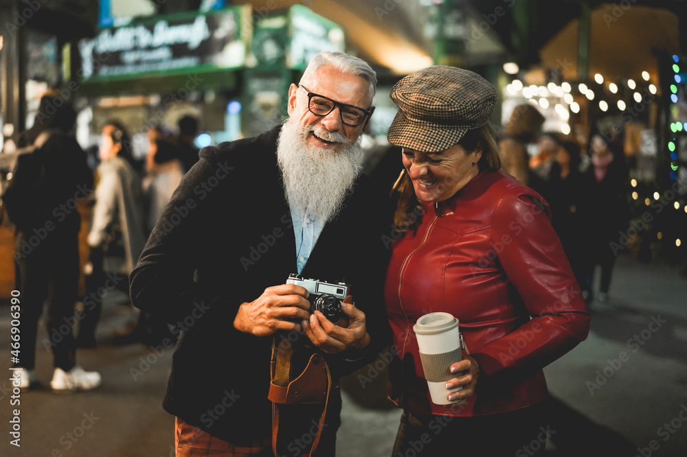 Fototapeta premium Senior couple having fun in london city at evening time - Soft focus on senior man face