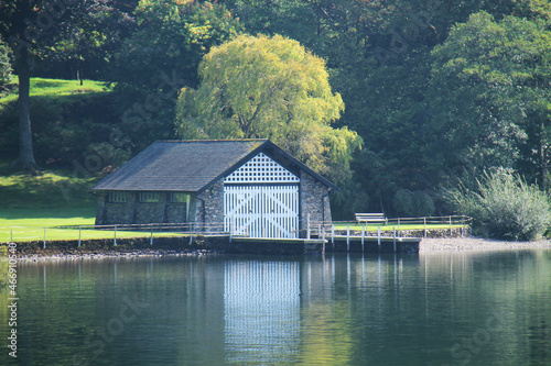 Photos A Large Stone Built Boat House on a Lake Side.