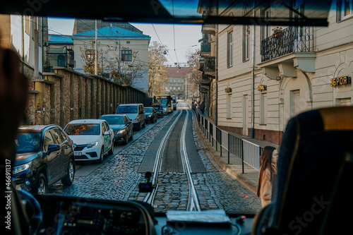 Lviv, Ukraine - Oktober 30, 2021. View of the streets of Lviv from tourist bus window. Travel concept. Sightseeing tour of historic old city center