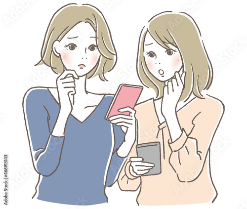 スマホを見て困る女性2人