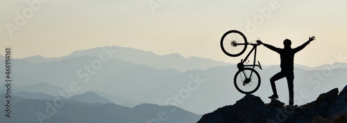 Young Man Exploring Nature by Bicycle