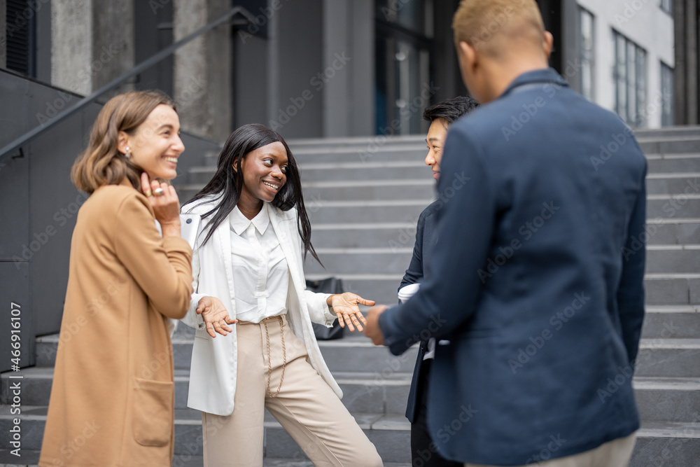 Asian businessman and caucasian businesswoman having fun meet each other on city street. Concept of modern successful business people. Idea of business cooperation. Joyful multiracial businessteam Asian businessman and caucasian businesswoman having fun meet each other on city street. Concept of modern successful business people. Idea of business cooperation. Joyful multiracial businessteam