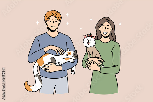 Enjoying animals and pets concept. Young smiling couple woman and man standing and holding cat and small dog on hands feeling love vector illustration 