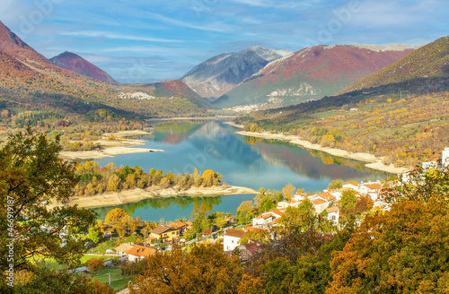 Lake Barrea, Italy - embedded in the wonderful Abruzzo, Lazio and Molise National Park, Lake Barrea is one of the most spectacular lakes of the Apennine Mountains, expecially during Autumn foliage photo
