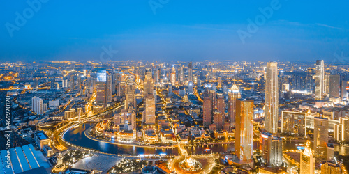 Aerial photography of Tianjin Jinwan Square and Century Clock CBD city skyline at night, China
